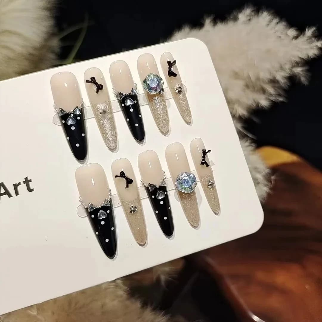 Zwarte vlinder strass kunstnagels, cat eye glitter manicure