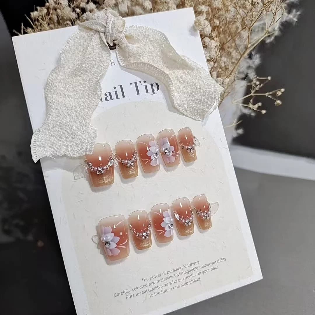 Floral cat eye press-on nails met sterrendesign