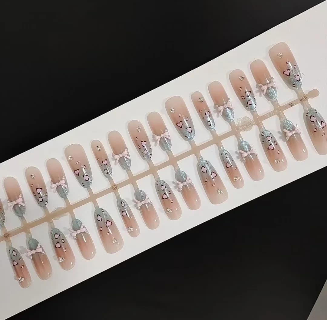Press-on nails zeezout luipaard cat eye strik, lange stiletto