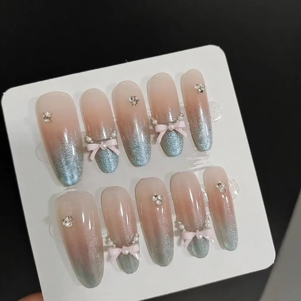 Press-on nails zeezout luipaard cat eye strik, lange stiletto