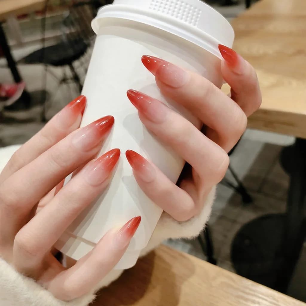 Lange press-on nails met kleurverloop en sterrenpatroon