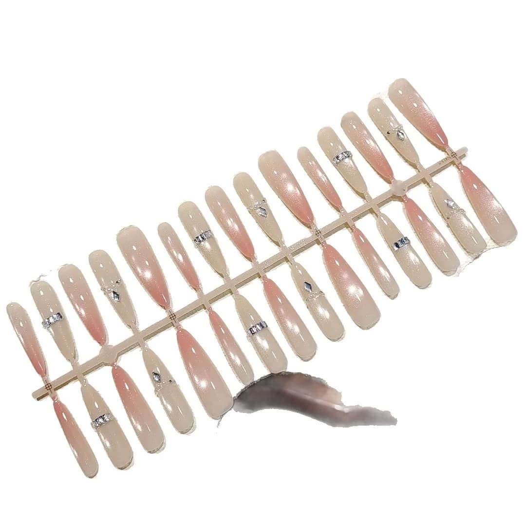 Roze Cat Eye Press-On Nails Zachte Gloed Perzik Stiletto Vorm
