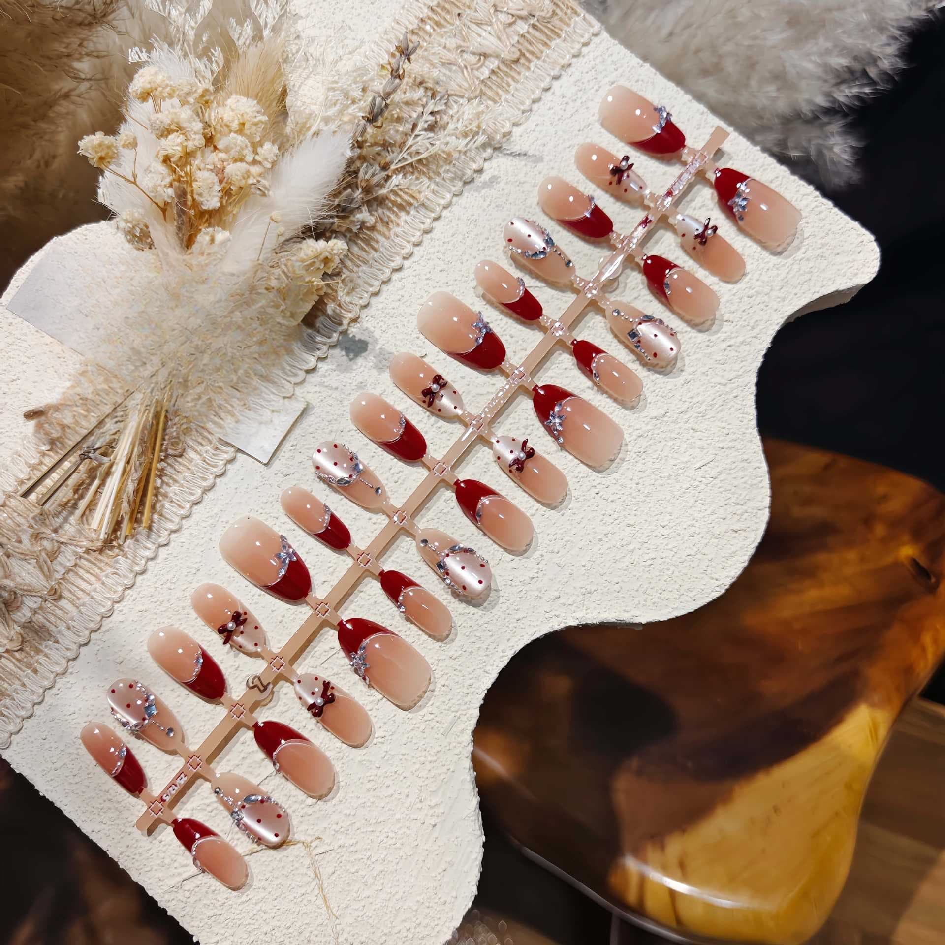 Rode French Tip Cat Eye Press-On Nails met Strik Ontwerp